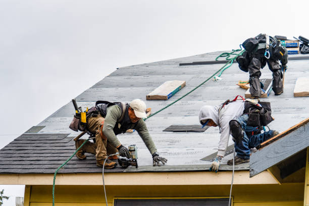 Professional Roofing technician working in Kingston, RI